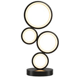 Maviq Helix Lumina spiral LED table lamp styled on a tabletop